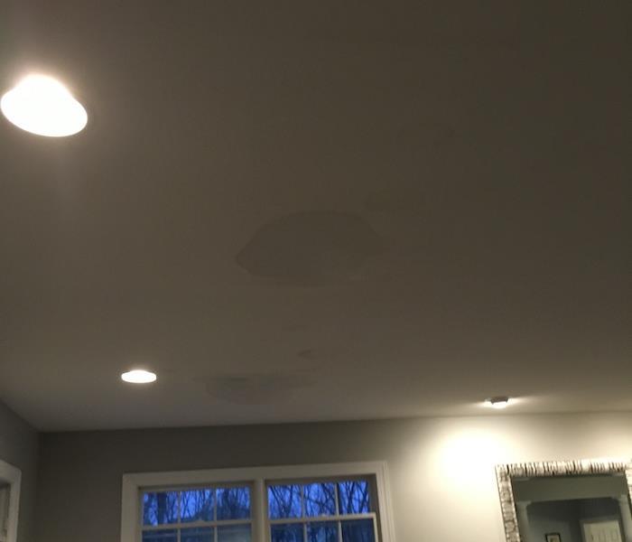 Ceiling with water damage stains